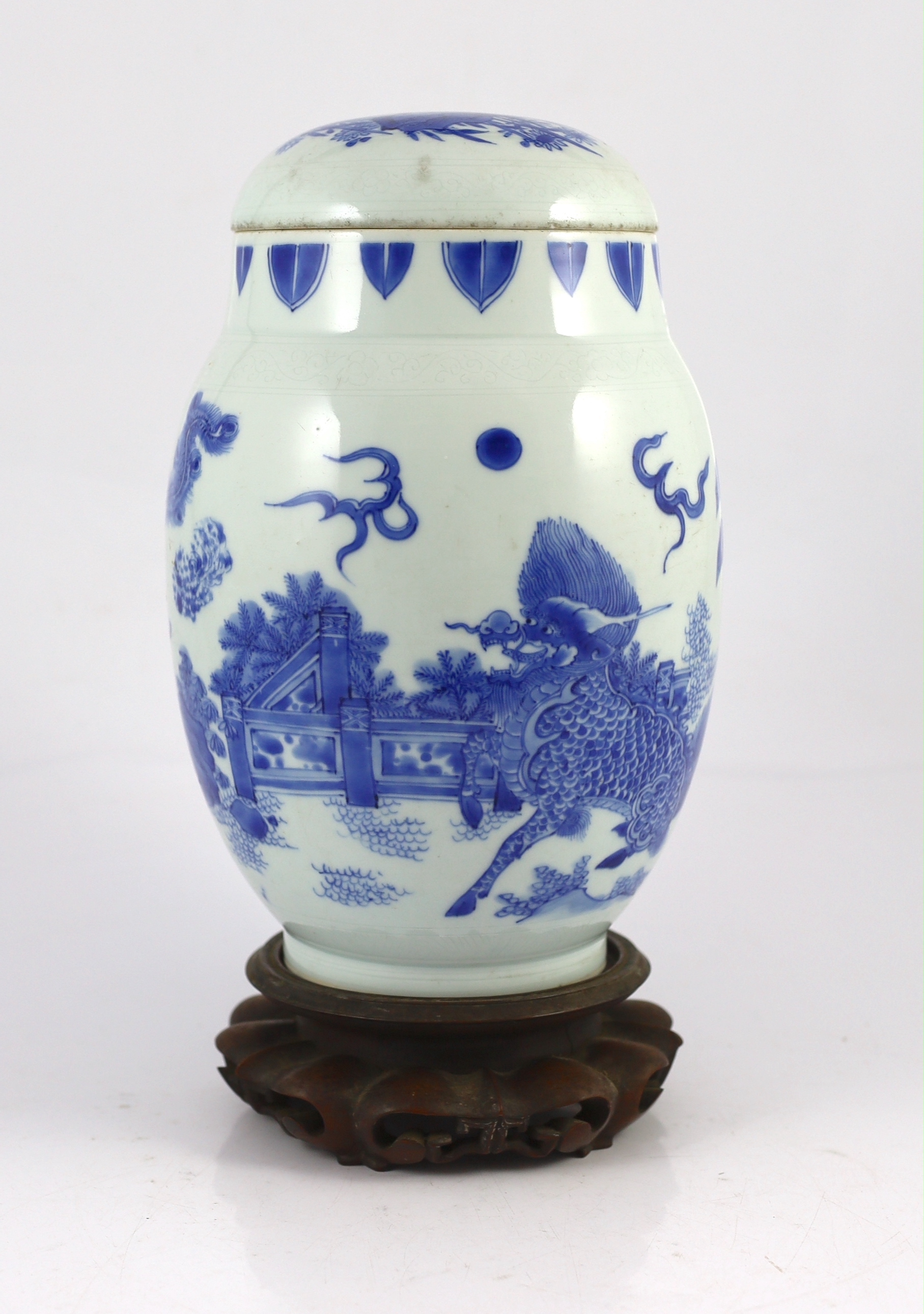A good Chinese Transitional blue and white ‘qilin and phoenix’ jar and cover, lianzi guan, Chongzhen period (1627-1644), chips to inner flange of cover